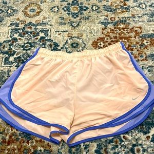 Pink and Purple Nike dry fit shorts with built in underwear inside.